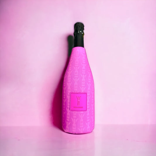 Pink neoprene 750mL champagne bottle insulator sleeve with zipper, featuring a repeating Bomber pattern on a pink background.⁠
